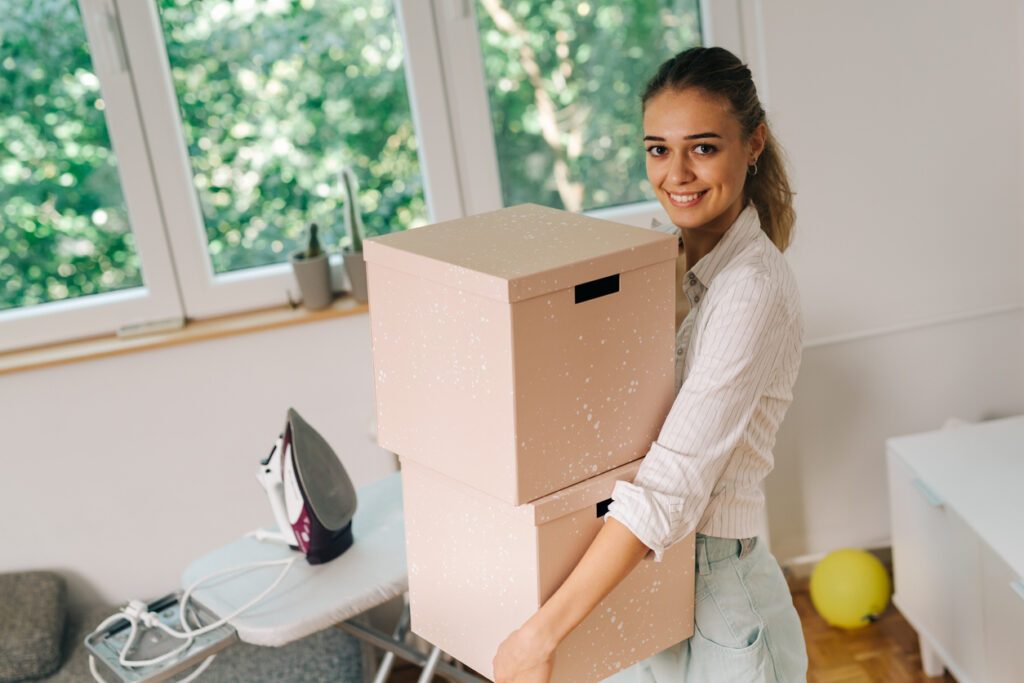 college girl holding two boxes