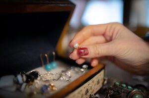 Women's hands choosing accessories